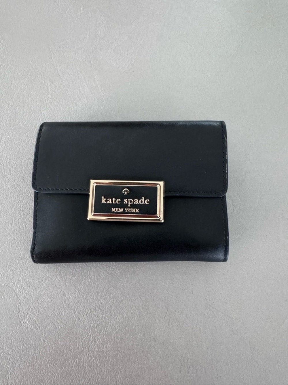 kate spade Black Leather Trifold Wallet with Gold Plaque